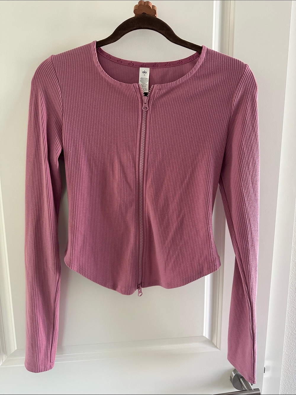 ALO Yoga Ribbed Zip-Front Long Sleeve Top in Mauve Pink